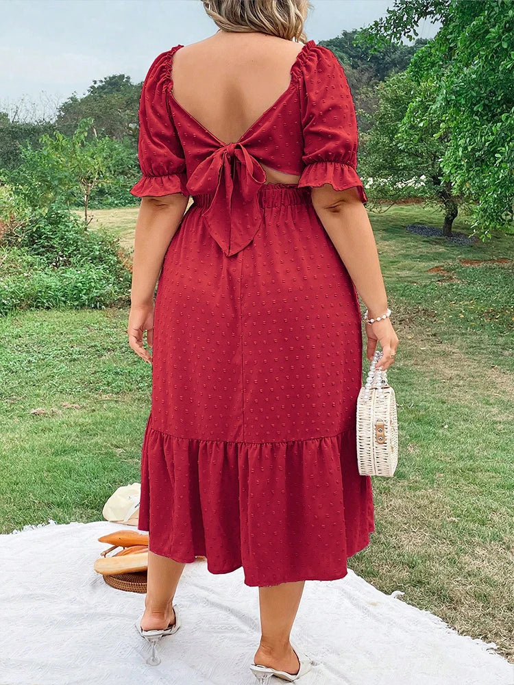 Emilie's Boutique ™ Solid-color back-tie dress.