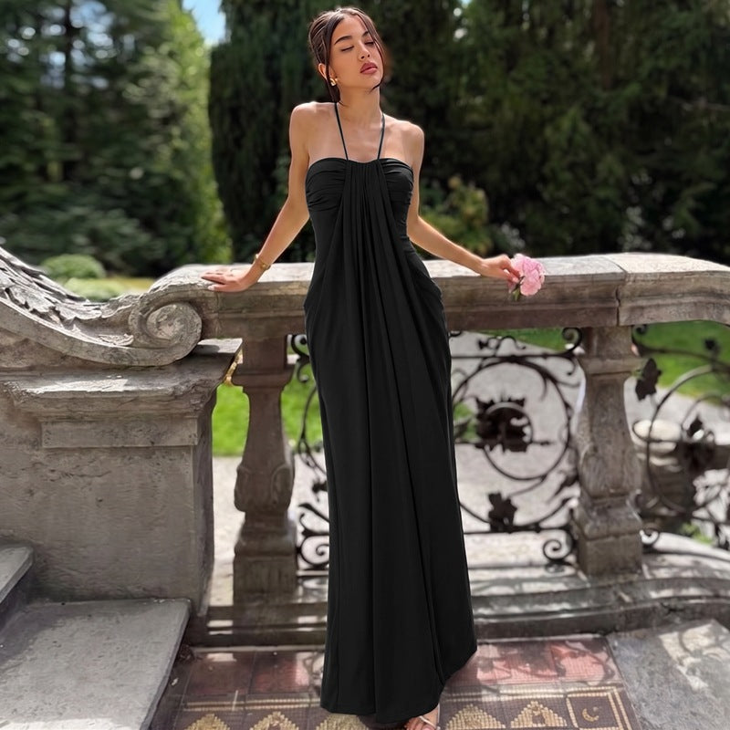 Emilie's Boutique β’ Draped, form-fitting halter maxi dress