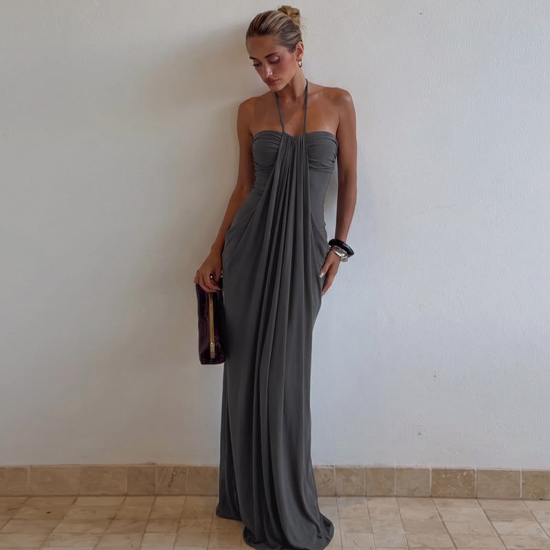 Emilie's Boutique β’ Draped, form-fitting halter maxi dress