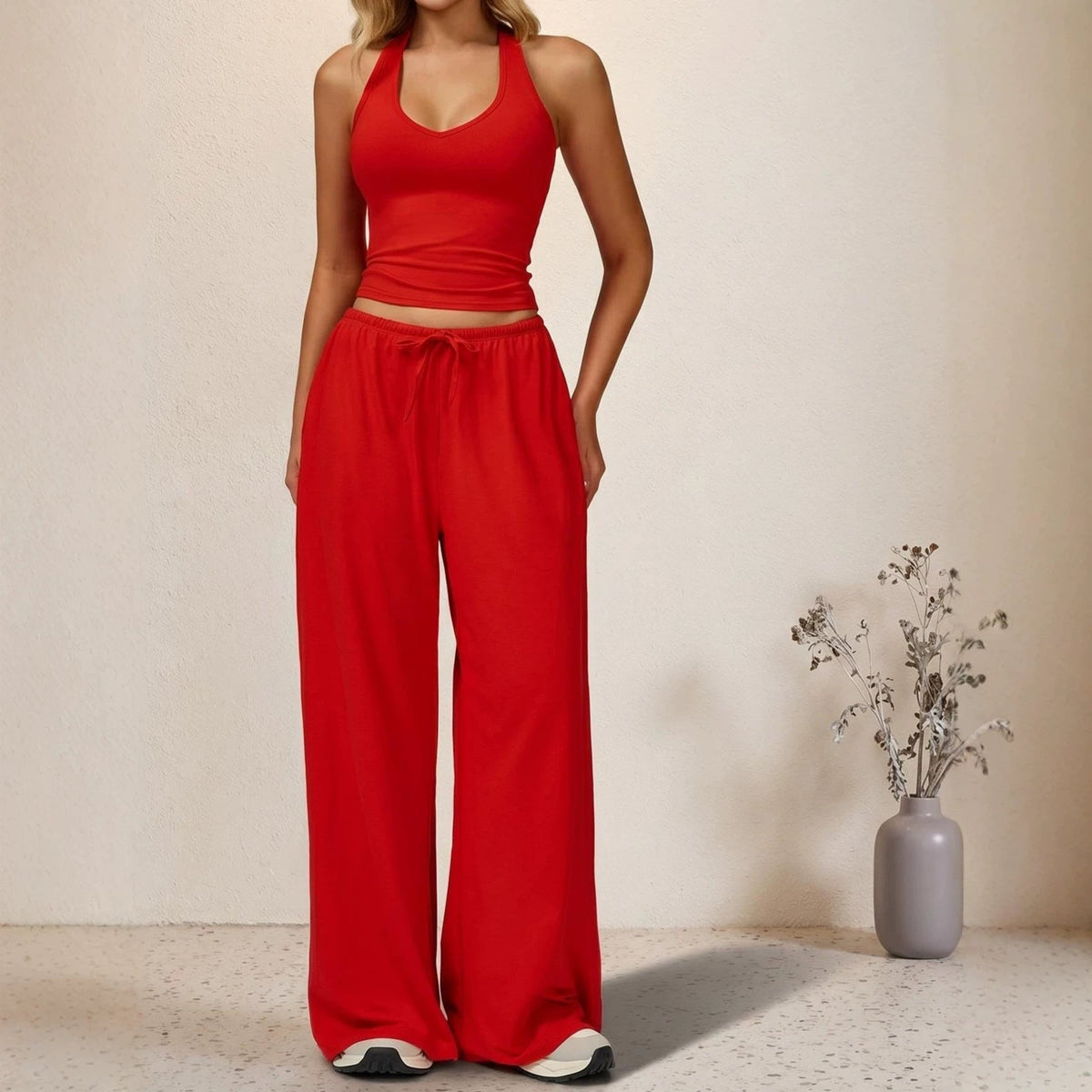Emilie's Boutique β’ halter neck top and drawstring pants two-piece set