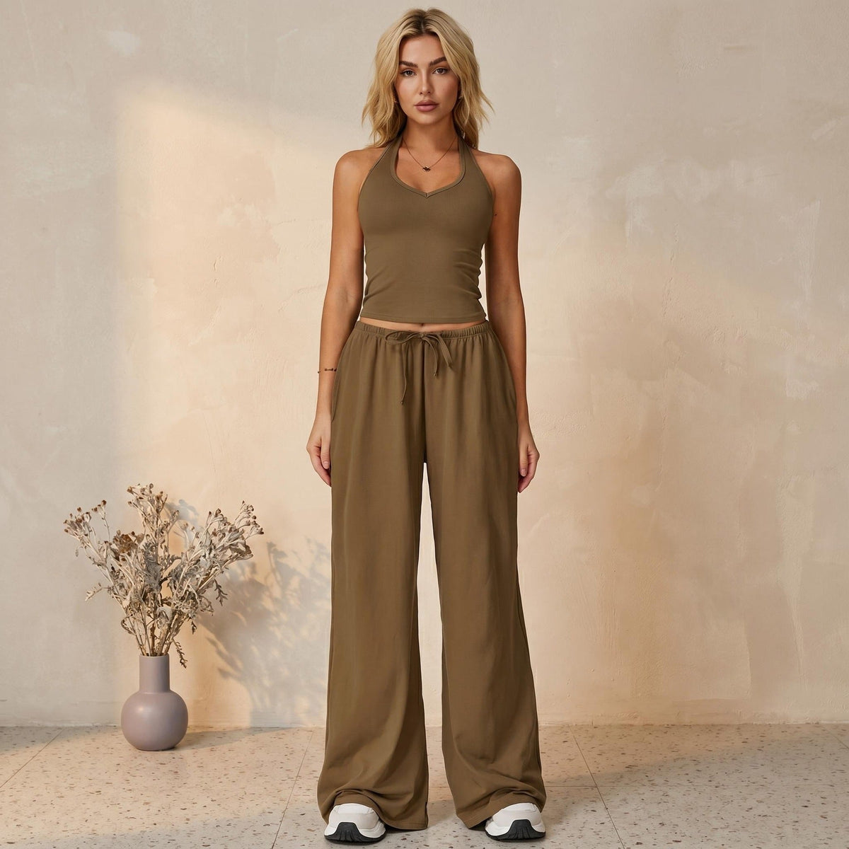 Emilie's Boutique β’ Sporty halter neck top and drawstring pants two-piece set