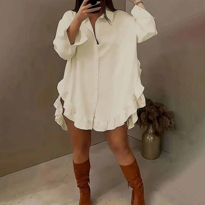 Emilie's Boutique β’ Loose-fitting ruffled hem shirt