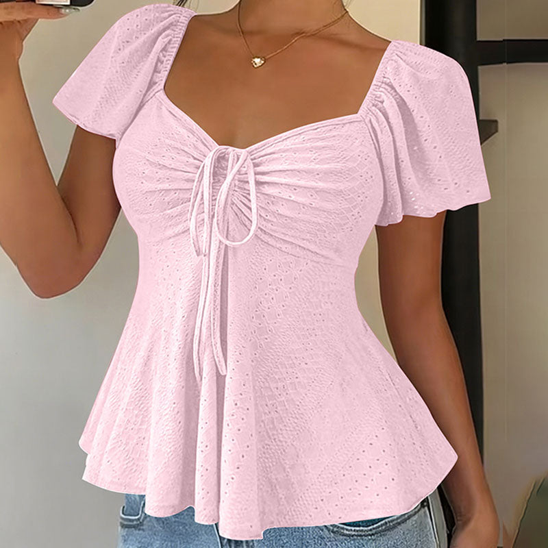 Emilie's Boutique β’ V-neck cut-out embroidered peplum top