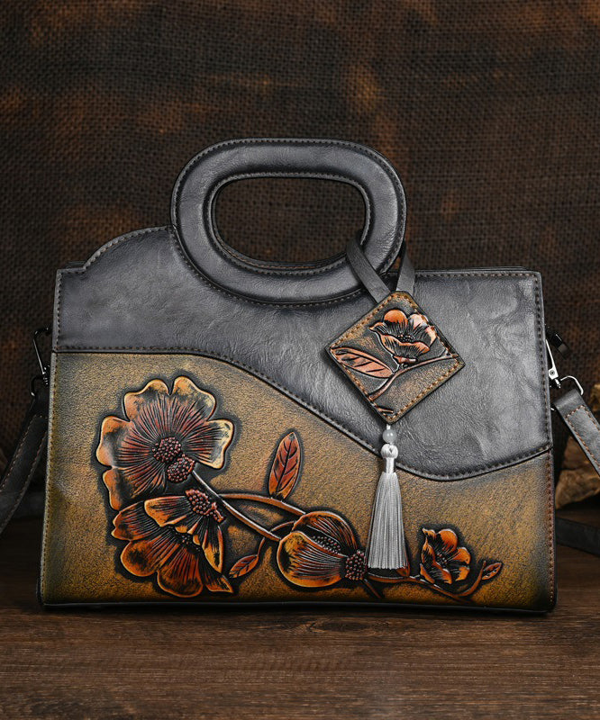 Emilie's Boutique ™ Camel Embossed Hand Held Bag