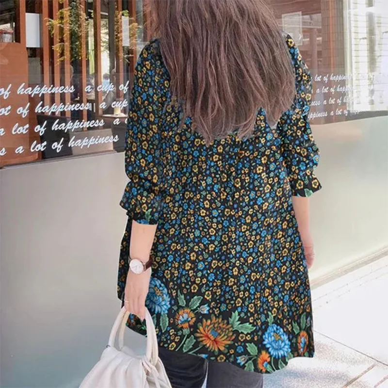 Emilie's Boutique ™  multicolored floral print top